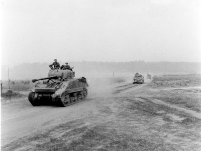 Tanks on the Move to Vire Over the Tank Runs, c.1945 by English Photographer